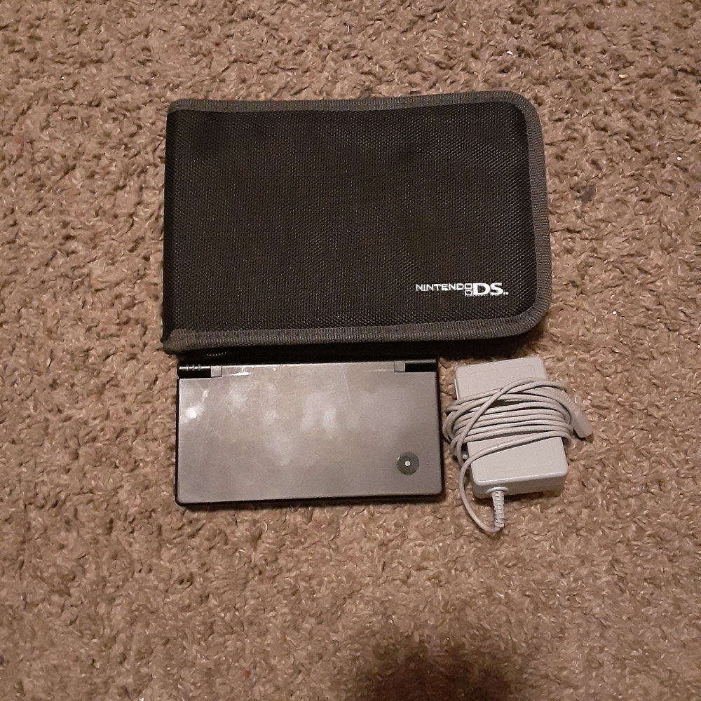 Nintendo dsi plus charger and game holder 50$